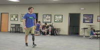 Teen Boy Walking With Prosthetic Leg